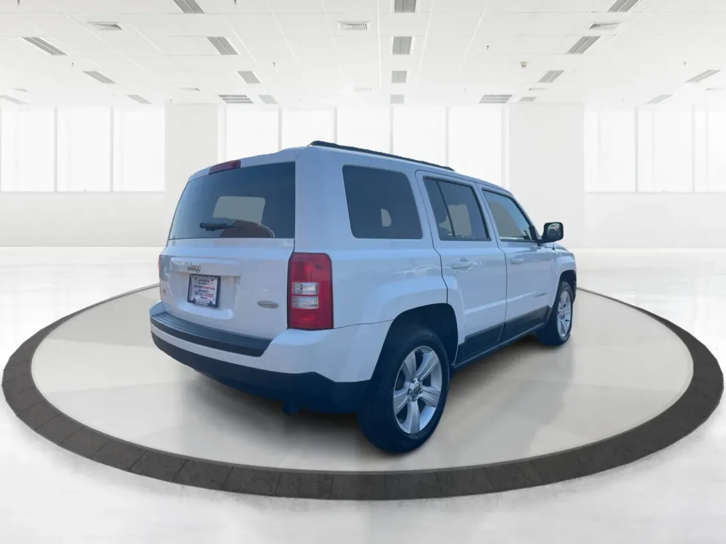 2014 Jeep Patriot Latitude (1C4NJPFB0ED) with an 2.4L I-4 DOHC engine, located at 880 E. National Road, Vandalia, OH, 45377, (937) 908-9800, 39.891918, -84.183594 - **Adventure Awaits with This 2014 Jeep Patriot Latitude! Perfect for Road Trips and Family Outings!**<br /> <br /> Explore the open road with confidence and comfort in this 2014 Jeep Patriot Latitude, now available at Advantage Car and Credit in Fairborn, OH. This SUV is the ideal companion for grow - Photo#2