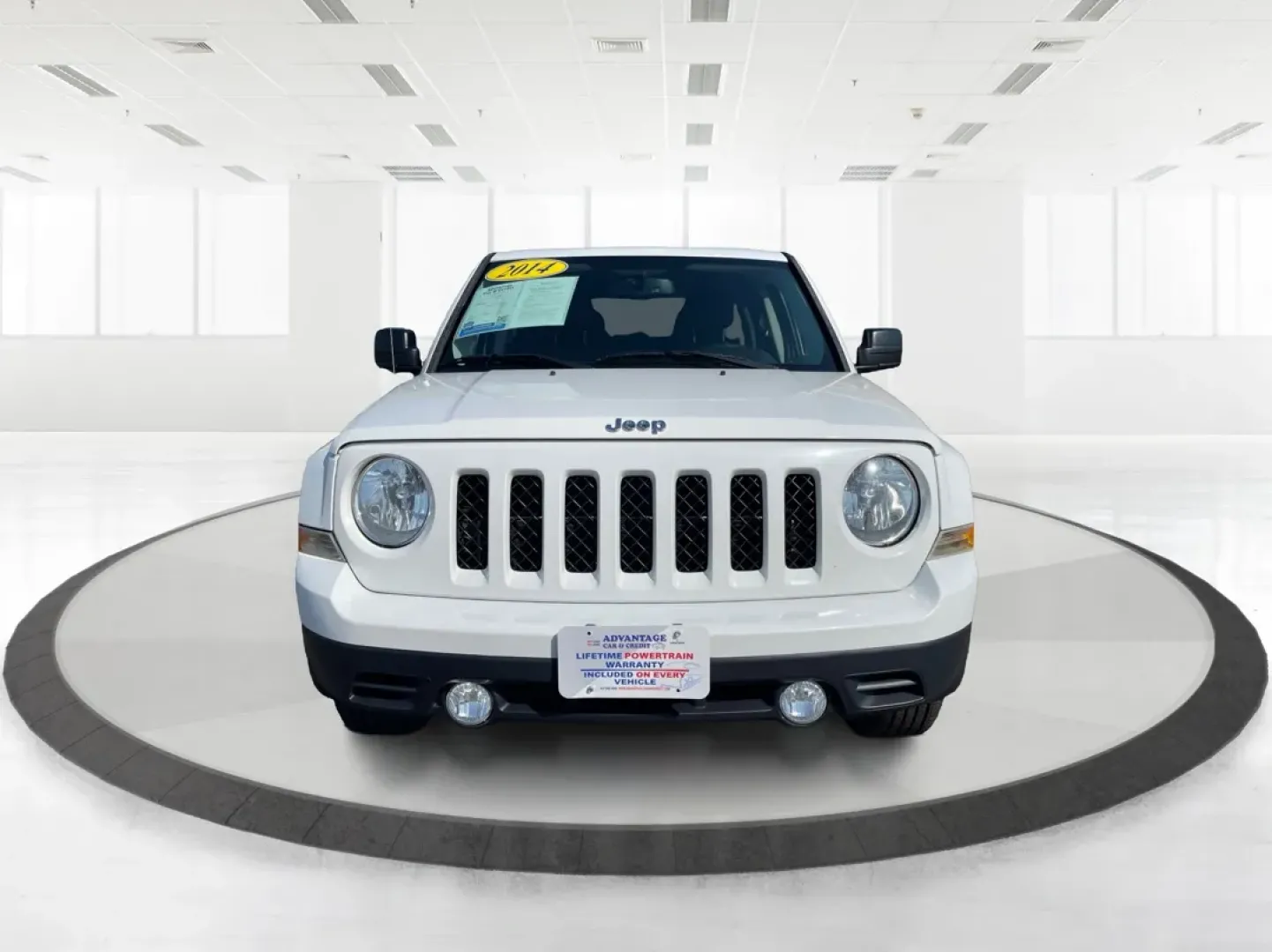 2014 Jeep Patriot Latitude (1C4NJPFB0ED) with an 2.4L I-4 DOHC engine, located at 880 E. National Road, Vandalia, OH, 45377, (937) 908-9800, 39.891918, -84.183594 - **Adventure Awaits with This 2014 Jeep Patriot Latitude! Perfect for Road Trips and Family Outings!**<br /> <br /> Explore the open road with confidence and comfort in this 2014 Jeep Patriot Latitude, now available at Advantage Car and Credit in Fairborn, OH. This SUV is the ideal companion for grow - Photo#7