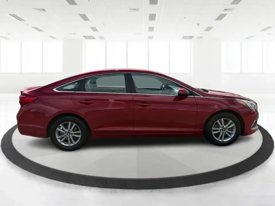 2017 Hyundai Sonata SE (5NPE24AF8HH) with an 2.4L L4 DOHC 16V engine, 7A transmission, located at 1099 N County Rd 25A, Troy, OH, 45373, (937) 908-9800, 40.057079, -84.212883 - Need a reliable, comfortable sedan for the daily drive from Troy to Dayton, school drop-offs, or quick weekend getaways to Charleston Falls Preserve? This red 2017 Hyundai Sonata Base is built for real life-easy to park downtown near the Miami County Courthouse, smooth on I75, and efficient enough f - Photo#1