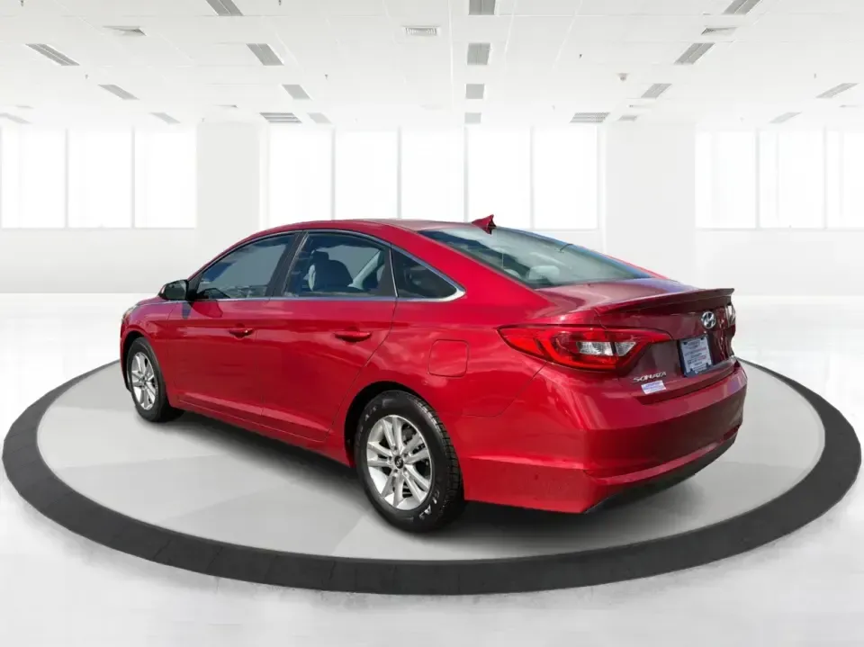 2017 Hyundai Sonata SE (5NPE24AF8HH) with an 2.4L L4 DOHC 16V engine, 7A transmission, located at 1099 N County Rd 25A, Troy, OH, 45373, (937) 908-9800, 40.057079, -84.212883 - Need a reliable, comfortable sedan for the daily drive from Troy to Dayton, school drop-offs, or quick weekend getaways to Charleston Falls Preserve? This red 2017 Hyundai Sonata Base is built for real life-easy to park downtown near the Miami County Courthouse, smooth on I75, and efficient enough f - Photo#4