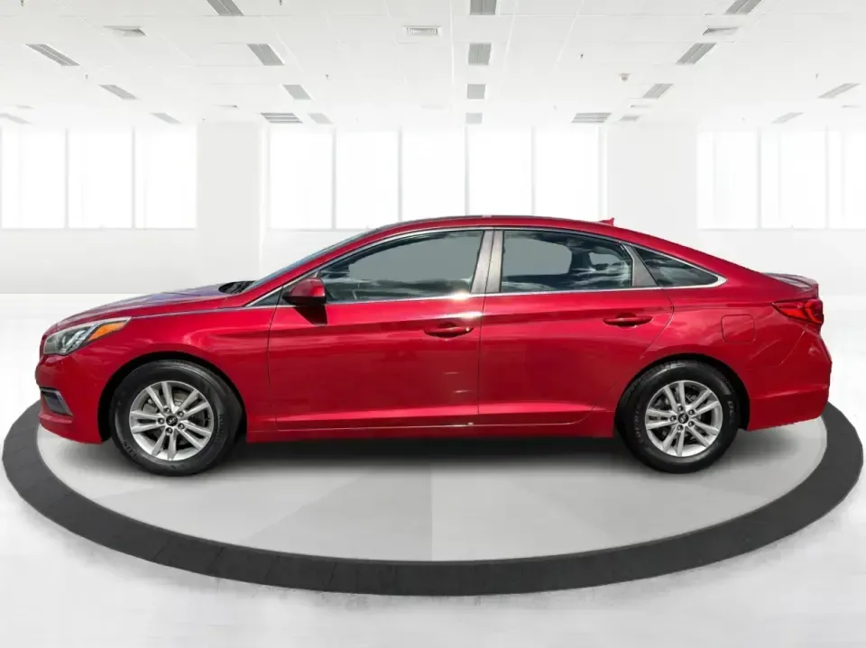 2017 Hyundai Sonata SE (5NPE24AF8HH) with an 2.4L L4 DOHC 16V engine, 7A transmission, located at 1099 N County Rd 25A, Troy, OH, 45373, (937) 908-9800, 40.057079, -84.212883 - Need a reliable, comfortable sedan for the daily drive from Troy to Dayton, school drop-offs, or quick weekend getaways to Charleston Falls Preserve? This red 2017 Hyundai Sonata Base is built for real life-easy to park downtown near the Miami County Courthouse, smooth on I75, and efficient enough f - Photo#5