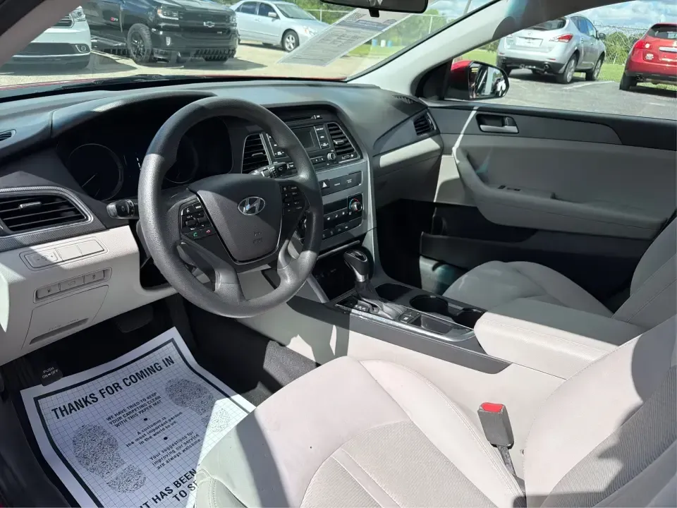 2017 Hyundai Sonata SE (5NPE24AF8HH) with an 2.4L L4 DOHC 16V engine, 7A transmission, located at 1099 N County Rd 25A, Troy, OH, 45373, (937) 908-9800, 40.057079, -84.212883 - Need a reliable, comfortable sedan for the daily drive from Troy to Dayton, school drop-offs, or quick weekend getaways to Charleston Falls Preserve? This red 2017 Hyundai Sonata Base is built for real life-easy to park downtown near the Miami County Courthouse, smooth on I75, and efficient enough f - Photo#9