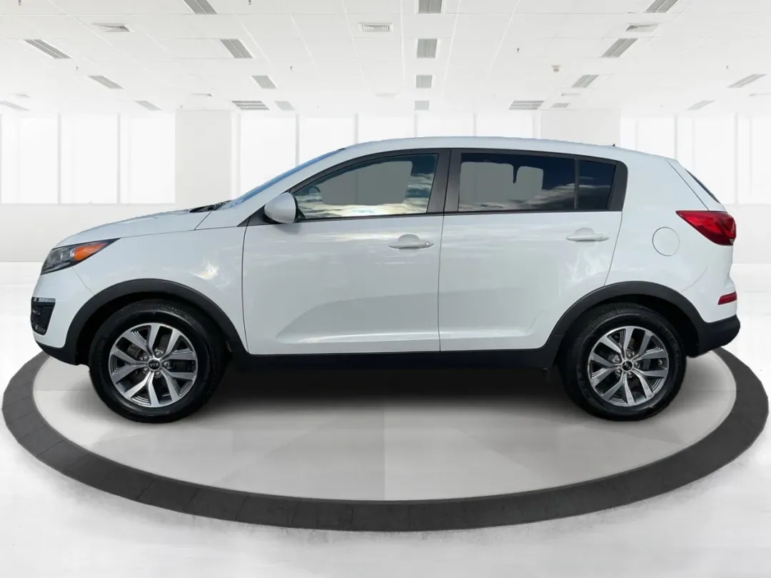 2015 Kia Sportage LX (KNDPB3AC1F7) with an Other engine, located at 4508 South Dixie Dr, Moraine, OH, 45439, (937) 908-9800, 39.689976, -84.218452 - Are you looking for a versatile vehicle that can handle your family's daily adventures while also being budget-friendly? Look no further than this 2015 Kia Sportage LX, now available at Advantage Car and Credit in Fairborn, OH. This stylish crossover SUV is perfect for growing families, weekend geta - Photo#4