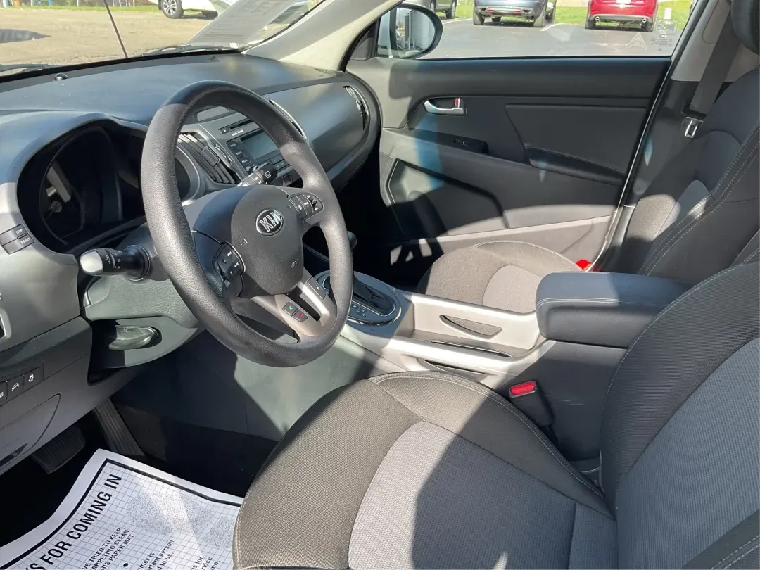 2015 Kia Sportage LX (KNDPB3AC1F7) with an Other engine, located at 4508 South Dixie Dr, Moraine, OH, 45439, (937) 908-9800, 39.689976, -84.218452 - Are you looking for a versatile vehicle that can handle your family's daily adventures while also being budget-friendly? Look no further than this 2015 Kia Sportage LX, now available at Advantage Car and Credit in Fairborn, OH. This stylish crossover SUV is perfect for growing families, weekend geta - Photo#8