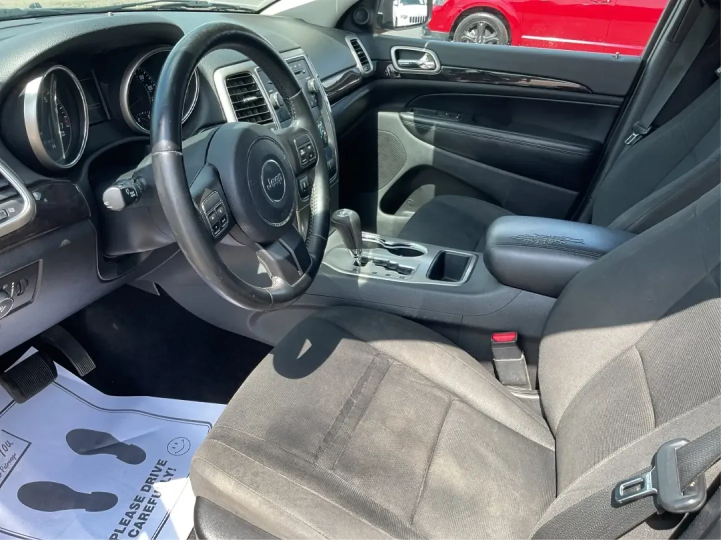 2013 Jeep Grand Cherokee Laredo (1C4RJFAG7DC) with an Other engine, located at 1184 Kauffman Ave, Fairborn, OH, 45324, (937) 908-9800, 39.807072, -84.030914 - Are you ready to elevate your driving experience? Whether you're a growing family in need of spacious comfort, a weekend adventurer seeking reliability, or simply someone looking for a dependable daily driver, the 2013 Jeep Grand Cherokee Laredo is the perfect vehicle for you. Located at Advantage C - Photo#9