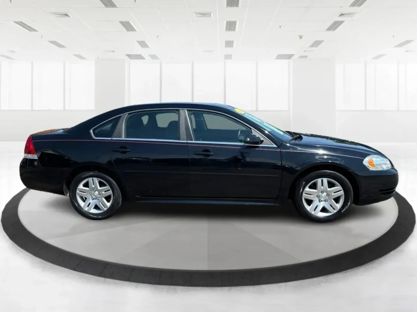2014 Chevrolet Impala Limited LT (2G1WB5E3XE1) with an 3.6L V-6 gasoline direct injection engine, located at 1951 S Dayton Lakeview Rd., New Carlisle, OH, 45344, (937) 908-9800, 39.890999, -84.050255 - Are you ready for your next adventure, whether it's a family road trip, a daily commute, or simply running errands around Fairborn? The 2014 Chevrolet Impala Limited LT is the perfect sedan to elevate your driving experience. With its stylish black exterior and reliable performance, this vehicle is - Photo#1