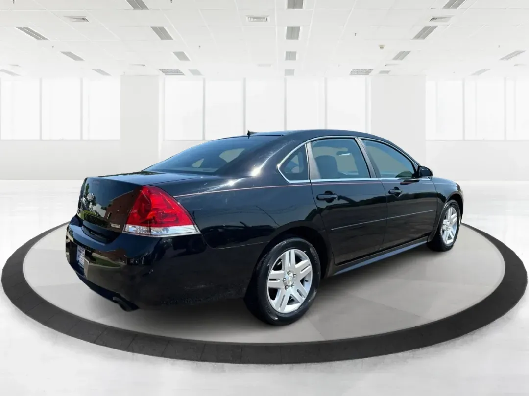 2014 Chevrolet Impala Limited LT (2G1WB5E3XE1) with an 3.6L V-6 gasoline direct injection engine, located at 1230 East Main St, Xenia, OH, 45385, (937) 908-9800, 39.688026, -83.910172 - Are you ready for your next adventure, whether it's a family road trip, a daily commute, or simply running errands around Fairborn? The 2014 Chevrolet Impala Limited LT is the perfect sedan to elevate your driving experience. With its stylish black exterior and reliable performance, this vehicle is - Photo#2