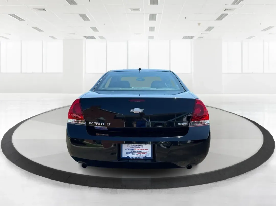 2014 Chevrolet Impala Limited LT (2G1WB5E3XE1) with an 3.6L V-6 gasoline direct injection engine, located at 1230 East Main St, Xenia, OH, 45385, (937) 908-9800, 39.688026, -83.910172 - Are you ready for your next adventure, whether it's a family road trip, a daily commute, or simply running errands around Fairborn? The 2014 Chevrolet Impala Limited LT is the perfect sedan to elevate your driving experience. With its stylish black exterior and reliable performance, this vehicle is - Photo#3
