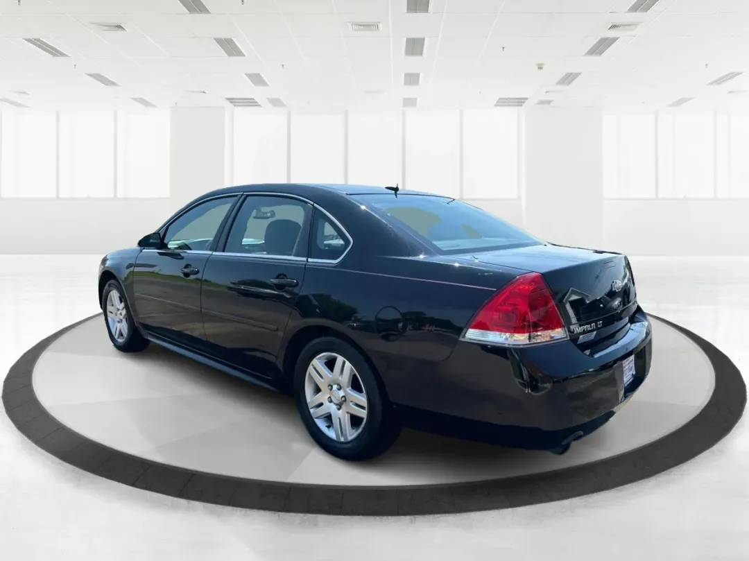 2014 Chevrolet Impala Limited LT (2G1WB5E3XE1) with an 3.6L V-6 gasoline direct injection engine, located at 1230 East Main St, Xenia, OH, 45385, (937) 908-9800, 39.688026, -83.910172 - Are you ready for your next adventure, whether it's a family road trip, a daily commute, or simply running errands around Fairborn? The 2014 Chevrolet Impala Limited LT is the perfect sedan to elevate your driving experience. With its stylish black exterior and reliable performance, this vehicle is - Photo#4