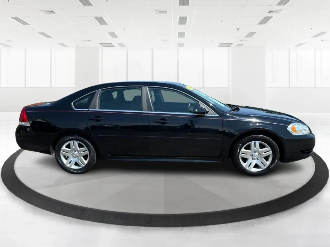 2014 Chevrolet Impala Limited LT (2G1WB5E3XE1) with an 3.6L V-6 gasoline direct injection engine, located at 8750 N County Rd 25A, Piqua, OH, 45356, (937) 908-9800, 40.164391, -84.232513 - Are you ready for your next adventure, whether it's a family road trip, a daily commute, or simply running errands around Fairborn? The 2014 Chevrolet Impala Limited LT is the perfect sedan to elevate your driving experience. With its stylish black exterior and reliable performance, this vehicle is - Photo#1