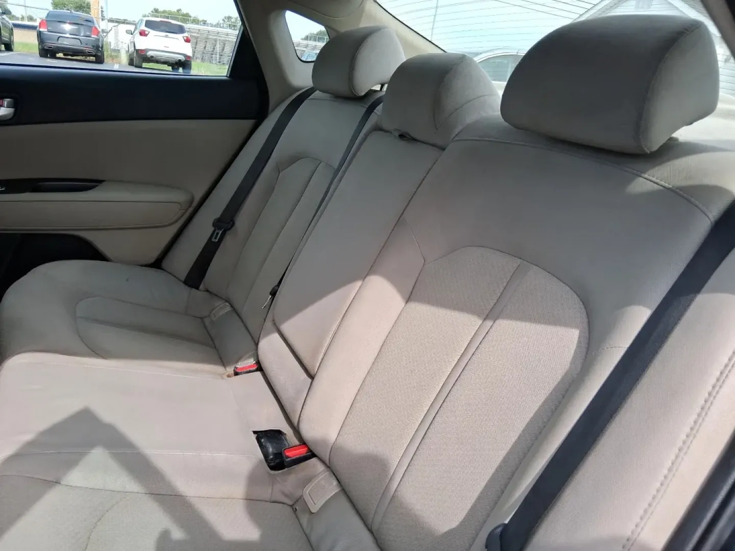 2016 Kia Optima LX (5XXGT4L36GG) with an Theta II 2.4L I-4 gasoline direct injection engine, located at 1184 Kauffman Ave, Fairborn, OH, 45324, (937) 908-9800, 39.807072, -84.030914 - Discover an exceptional driving experience with the 2016 Kia Optima LX, available now at Advantage Car and Credit in New Carlisle, OH. This sedan is not just a mode of transportation; it's an enhancement to your lifestyle, whether you're commuting to work, running errands, or embarking on weekend ad - Photo#10