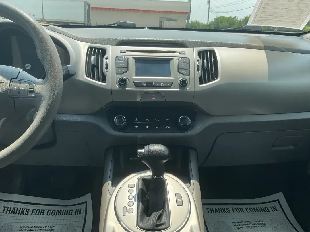 2016 Kia Sportage LX (KNDPBCACXG7) with an Theta II 2.4L I-4 gasoline direct injection engine, 6-Speed Automatic transmission, located at 401 Woodman Dr, Riverside, OH, 45431, (937) 908-9800, 39.760899, -84.123421 - Embrace the journey of life with the 2016 Kia Sportage LX, a vehicle designed for those who thrive on adventure and seek comfort in their daily commute. Whether you're navigating the bustling streets of Fairborn, OH, or embarking on a weekend family getaway, this versatile crossover is your perfect - Photo#13