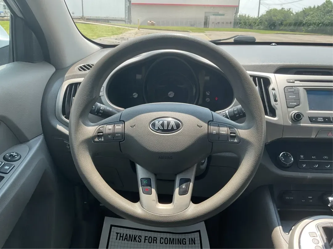 2016 Kia Sportage LX (KNDPBCACXG7) with an Theta II 2.4L I-4 gasoline direct injection engine, 6-Speed Automatic transmission, located at 401 Woodman Dr, Riverside, OH, 45431, (937) 908-9800, 39.760899, -84.123421 - Embrace the journey of life with the 2016 Kia Sportage LX, a vehicle designed for those who thrive on adventure and seek comfort in their daily commute. Whether you're navigating the bustling streets of Fairborn, OH, or embarking on a weekend family getaway, this versatile crossover is your perfect - Photo#16