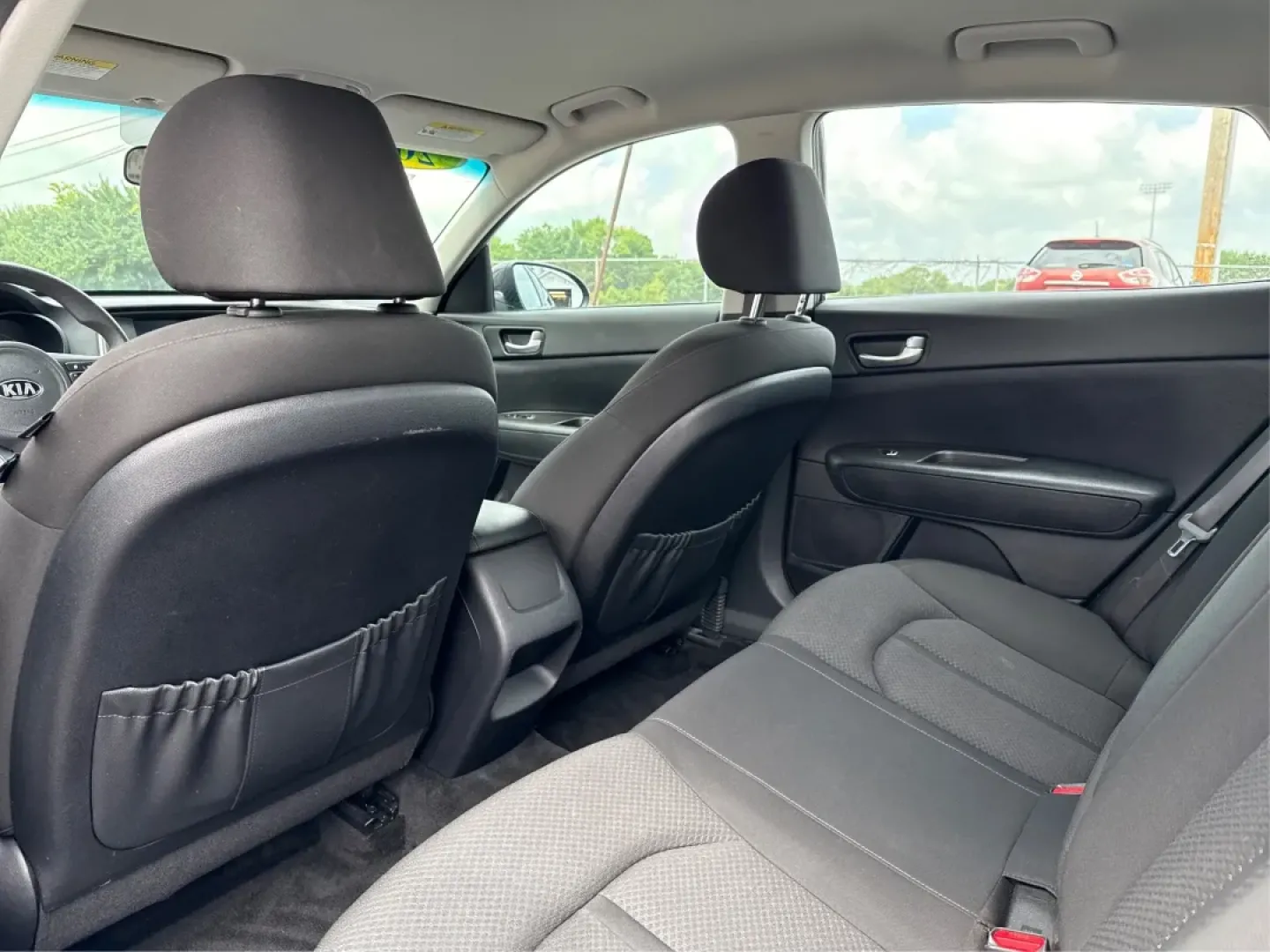 2018 Kia Optima LX (KNAGT4L33J5) with an Theta II 2.4L I-4 gasoline direct injection engine, located at 1099 N County Rd 25A, Troy, OH, 45373, (937) 908-9800, 40.057079, -84.212883 - **Experience the Perfect Blend of Style and Comfort with the 2018 Kia Optima LX at Advantage Car and Credit!**<br /> <br /> Are you searching for a reliable sedan that fits seamlessly into your busy lifestyle? Look no further! The 2018 Kia Optima LX is not just a means of transportation; it's your p - Photo#10