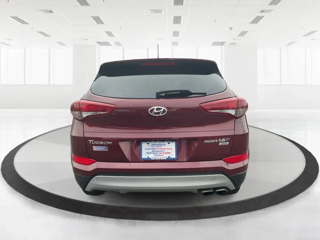 2017 Hyundai Tucson Sport (KM8J3CA29HU) with an 1.6L I-4 gasoline direct injection engine, located at 1951 S Dayton Lakeview Rd., New Carlisle, OH, 45344, (937) 908-9800, 39.890999, -84.050255 - **Discover Adventure in the 2017 Hyundai Tucson: Your Ideal SUV for Every Journey!**<br /> <br /> Are you ready to elevate your driving experience? The 2017 Hyundai Tucson in striking Ruby Wine is here, tailored for those who crave versatility and reliability in their daily adventures. Whether you'r - Photo#3