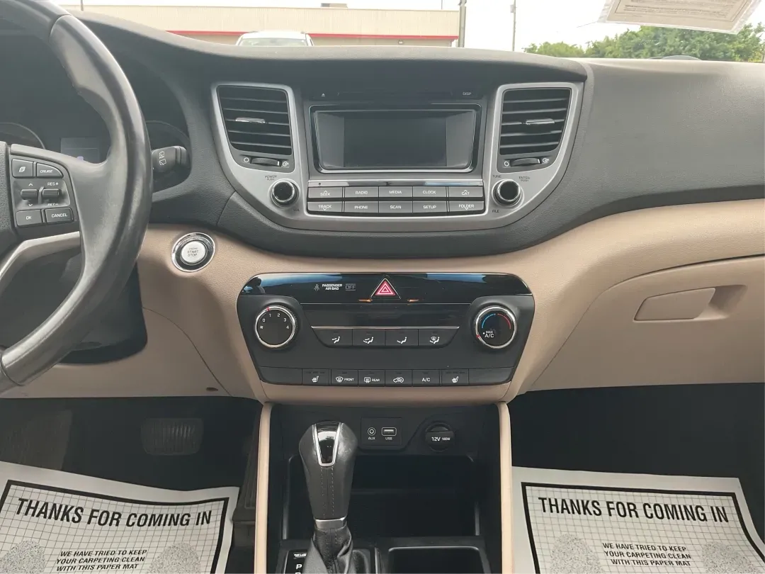 2017 Hyundai Tucson Sport (KM8J3CA29HU) with an 1.6L I-4 gasoline direct injection engine, located at 1951 S Dayton Lakeview Rd., New Carlisle, OH, 45344, (937) 908-9800, 39.890999, -84.050255 - **Discover Adventure in the 2017 Hyundai Tucson: Your Ideal SUV for Every Journey!**<br /> <br /> Are you ready to elevate your driving experience? The 2017 Hyundai Tucson in striking Ruby Wine is here, tailored for those who crave versatility and reliability in their daily adventures. Whether you'r - Photo#13