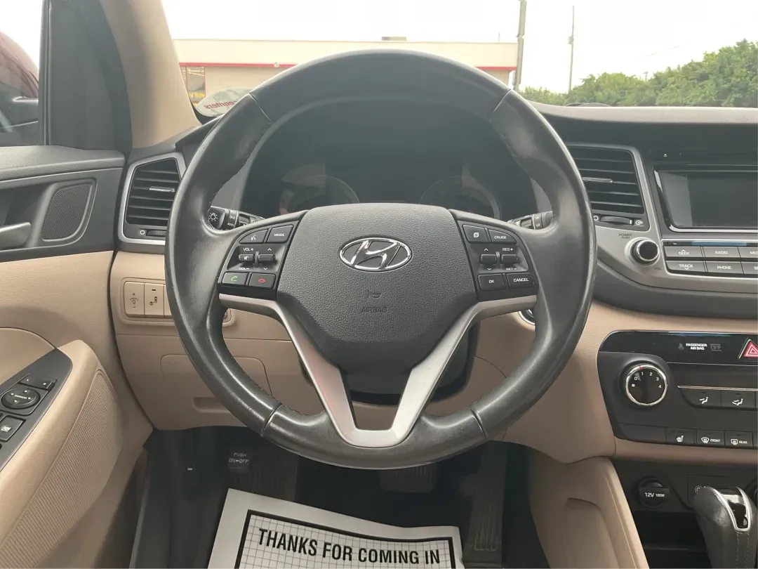 2017 Hyundai Tucson Sport (KM8J3CA29HU) with an 1.6L I-4 gasoline direct injection engine, located at 1951 S Dayton Lakeview Rd., New Carlisle, OH, 45344, (937) 908-9800, 39.890999, -84.050255 - **Discover Adventure in the 2017 Hyundai Tucson: Your Ideal SUV for Every Journey!**<br /> <br /> Are you ready to elevate your driving experience? The 2017 Hyundai Tucson in striking Ruby Wine is here, tailored for those who crave versatility and reliability in their daily adventures. Whether you'r - Photo#16